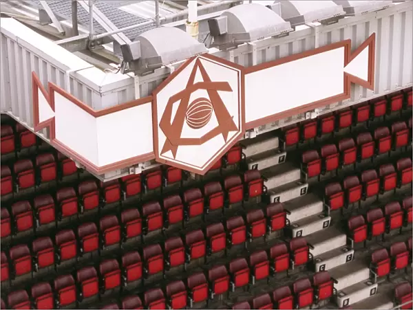 Arsenal Crest and seats, photographed from the North Bank