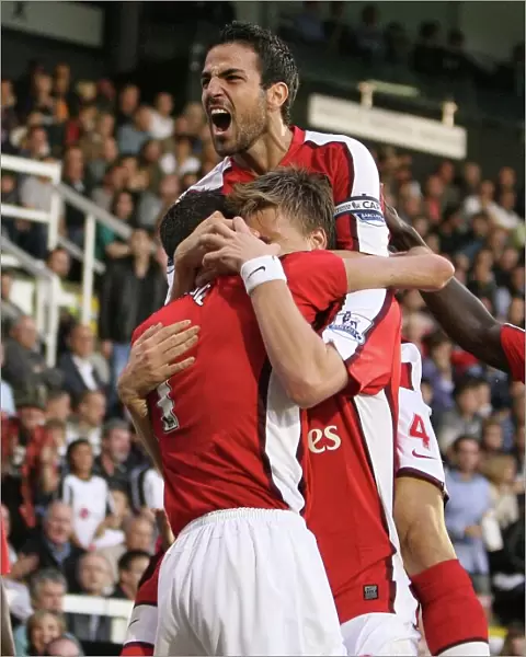 Cesc Fabregas celebrates the Arsenal goal score by Robin van Persie