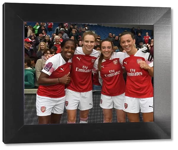 Celebrating Victory: Carter, Miedema, Evans, and McCabe of Arsenal