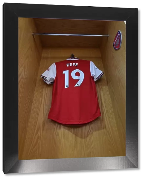 Arsenal's Nicolas Pepe Prepares for Aston Villa Clash in Emirates Stadium Changing Room