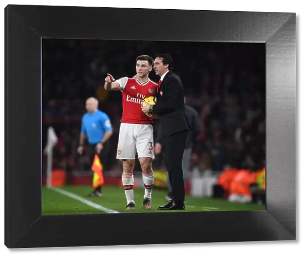 Strategic Talk: Unai Emery and Kieran Tierney at Emirates Stadium during Arsenal vs Southampton Match, 2019