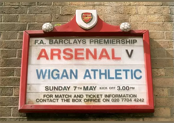 The fixture board displays the Wigan Athltic match, the last at Highbury