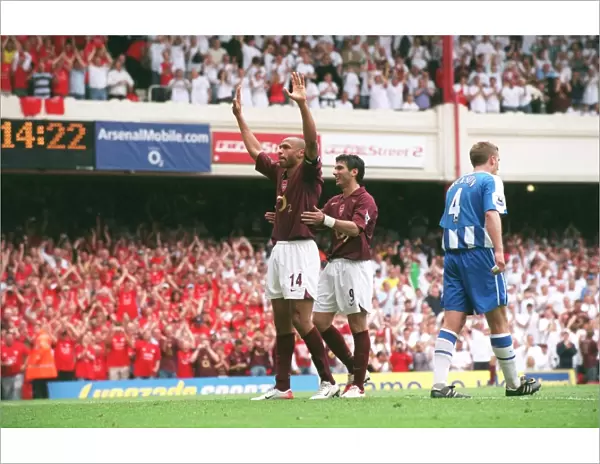 Thierry Henry celebrates scoring Arsenals 4th goal his 3rd with Jose Reyes