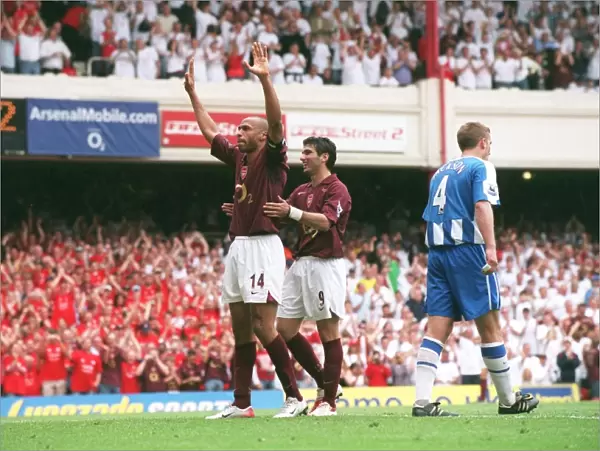 Thierry Henry celebrates scoring Arsenals 4th goal his 3rd with Jose Reyes