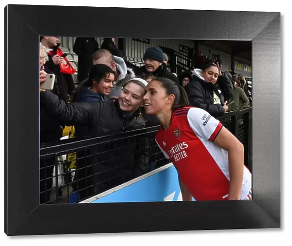 Arsenal's Rafaelle and Fan Celebrate Selfie Moment After Arsenal Women's Victory Over Manchester United (2021-22)