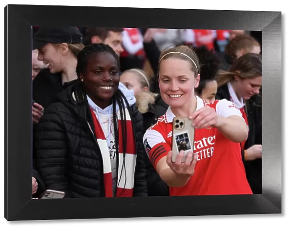 Arsenal Women Celebrate FA WSL Victory: Kim Little Amidst Jubilant Fans