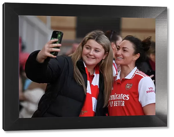 Arsenal Women Celebrate FA WSL Victory Over Tottenham Hotspur: Jodie Taylor Amidst Cheering Fans