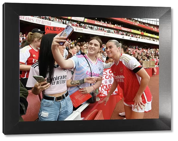 Arsenal's Alessia Russo and Fan Share a Selfie after Arsenal Women vs Liverpool Women Match at Emirates Stadium (2023-24)