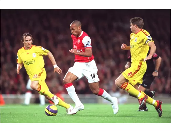 Thierry Henry (Arsenal) Bolo Zenden and Steven Garrard (Liverpool)
