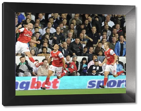 Henri Lansbury celebrates scoring the 1st Arsenal goal with Kieran Gibbs