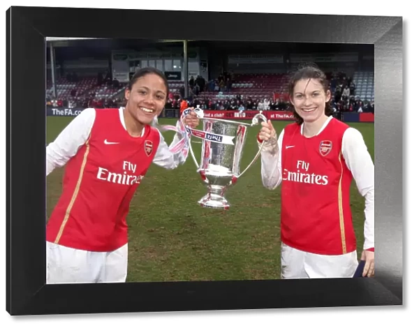 Alex Scott and Karen Carney (Arsenal) with the League Cup Trophy