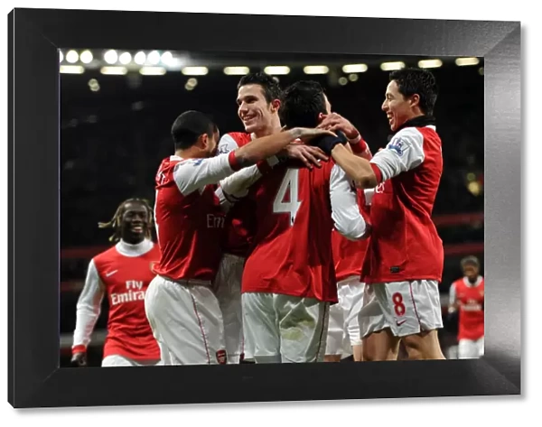 Celebrating Glory: Fabregas, Walcott, van Persie, and Nasri Rejoice in Arsenal's 3:1 Victory over Chelsea