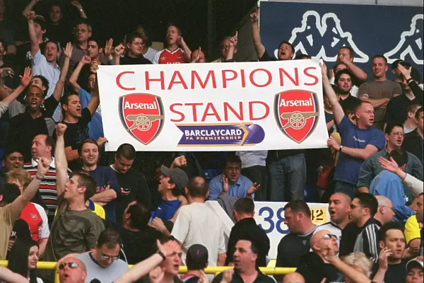 Arsenal fans with a Champions Banner. Tottenham Hotspur v Arsenal