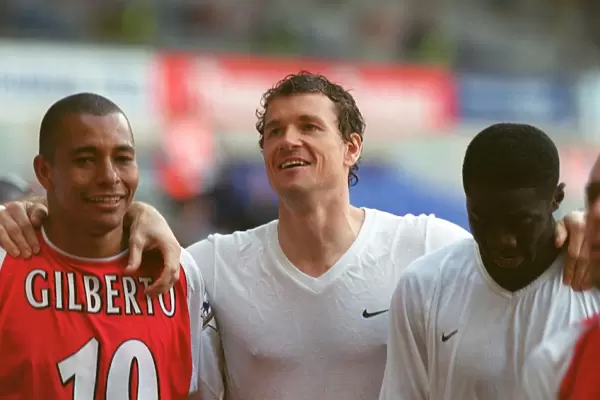 Gilberto, Jens Lehmann and Kolo Toure (Arsenal) celebrate winning the league