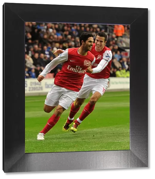 Mikel Arteta and Robin van Persie Celebrate Arsenal's Goal Against Wigan Athletic (2011-12)