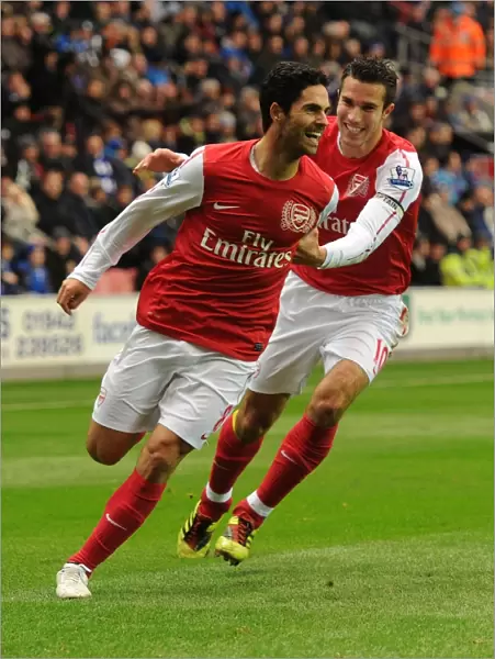 Mikel Arteta and Robin van Persie Celebrate Arsenal's Goal Against Wigan Athletic (2011-12)