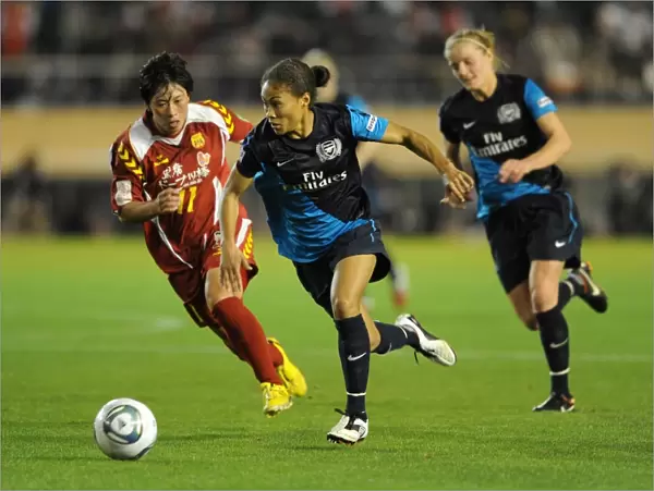 Rachel Yankey vs Megumi Takase: A Draw in Charity Match between Arsenal Ladies and INAC Kobe at Nishigaoka Stadium, Tokyo (November 30, 2011)