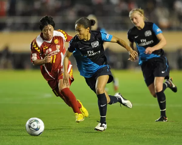 Rachel Yankey vs Megumi Takase: A Draw in Charity Match between Arsenal Ladies and INAC Kobe at Nishigaoka Stadium, Tokyo (November 30, 2011)