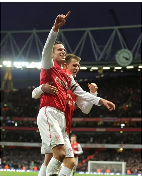 Van Persie and Ramsey: Arsenal's Unstoppable Duo Celebrate First Goal vs. Queens Park Rangers (2011-12)