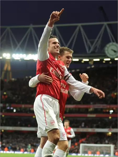 Van Persie and Ramsey: Arsenal's Unstoppable Duo Celebrate First Goal vs. Queens Park Rangers (2011-12)