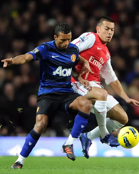 Arsenal vs Manchester United: Nico Yennaris Tackles Nani in Intense Premier League Clash