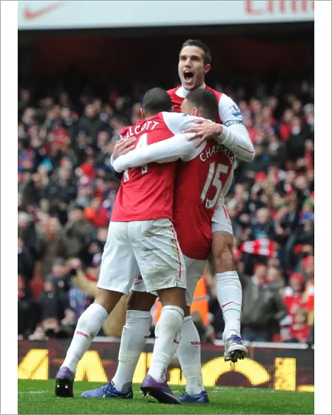 Arsenal's Oxlade-Chamberlain, Walcott, and van Persie Celebrate Goals Against Blackburn Rovers (2011-12)