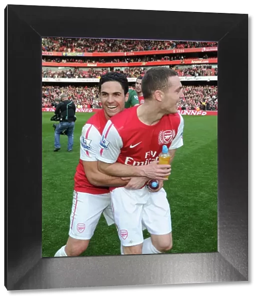 Celebrating Victory: Mikel Arteta and Thomas Vermaelen, Arsenal FC
