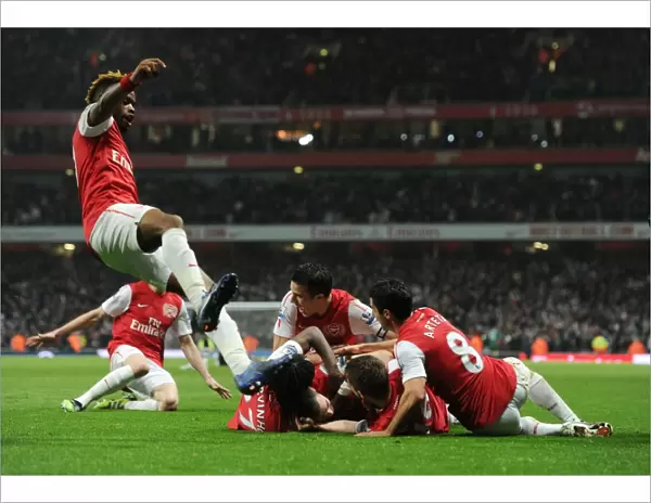 Arsenal Celebrate: Vermaelen Scores the Second Goal Against Newcastle United (2011-12)