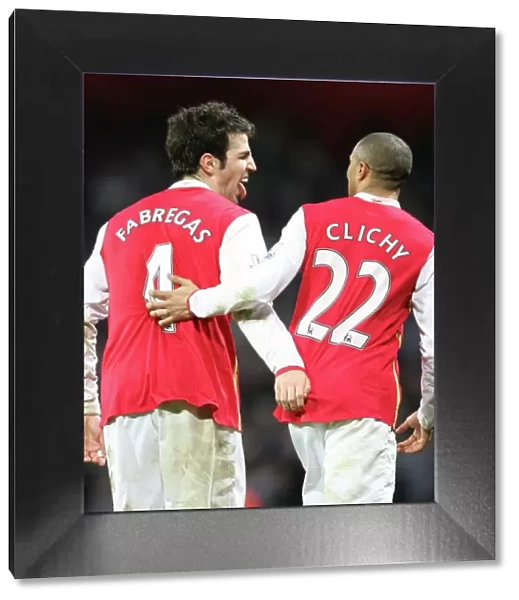 Cesc Fabregas and Gael Clichy celebrate the 3rd Arsenal goal