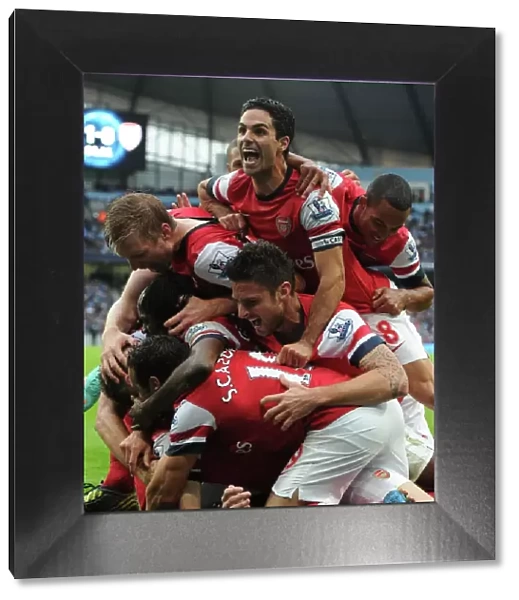 Arsenal's Celebration: Per Mertesacker, Gervinho, Santi Cazorla, Mikel Arteta, Theo Walcott, and Olivier Giroud