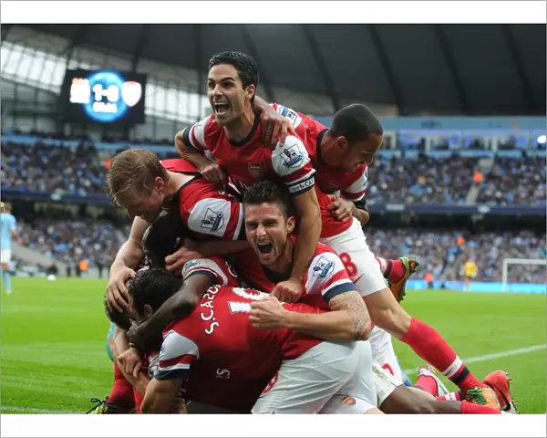 Arsenal's Unforgettable Moment: Koscielny's Goal Celebration with Team Mates Mertesacker, Gervinho, Cazorla, Arteta, and Walcott