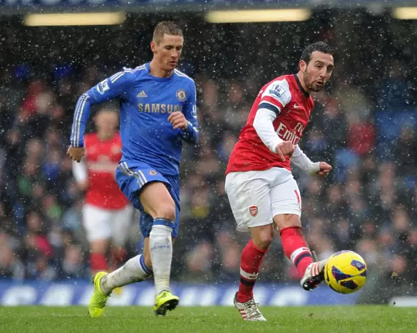 Cazorla vs. Torres: Intense Battle in Chelsea vs. Arsenal Premier League Clash