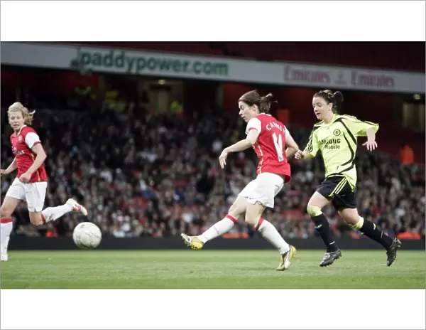 Karen Carney scores her 2nd goal Arsenals 4th under pressure from Sophie Perry
