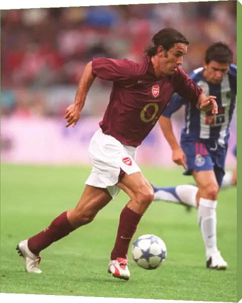 Thrilling Victory: Robert Pires Scores the Winning Goal for Arsenal at Amsterdam Tournament, 2005