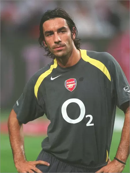 Euphoria Unleashed: Robert Pires Scores the Winning Goal for Arsenal at the 2005 Amsterdam Tournament vs Ajax