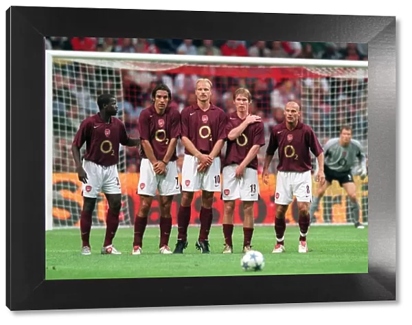 Arsenal Wall (L>R) emmaunel Eboue, Robert Pires, Dennis Bergkamp, Alex Hleb