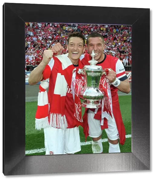 Arsenal FC: Celebrating FA Cup Victory - Ozil and Podolski's Triumph