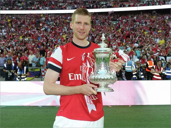 Arsenal's FA Cup Triumph: Per Mertesacker's Euphoric Celebration (2014)