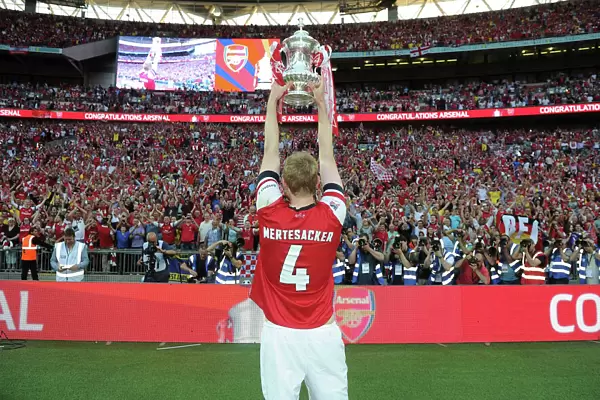 Per Mertesacker's Glory: Arsenal's FA Cup Victory at Wembley Stadium