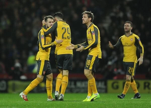 Aaron Ramsey celebrates scoring a goal for Arsenal. Preston North End 1: 2 Arsenal