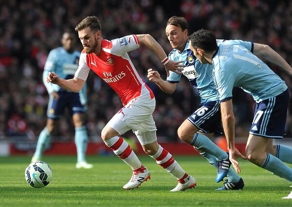 Aaron Ramsey vs. Mark Noble and Joey O'Brien: Intense Clash Between Arsenal and West Ham Players