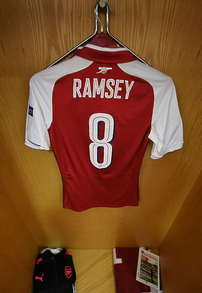 Aaron Ramsey's Empty Jersey: Arsenal FC vs Atletico Madrid, UEFA Europa League Semi-Final Leg One