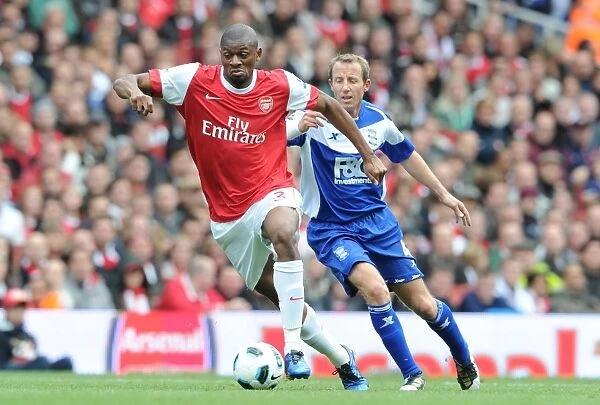 Abou Diaby (Arsenal) Lee Bowyer (Birmingham). Arsenal 2: 1 Birmingham City