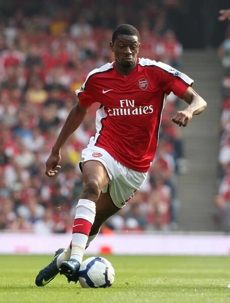 Abou Diaby's Dominant Performance: Arsenal's 4-0 Victory Over Wigan Athletic in the Premier League