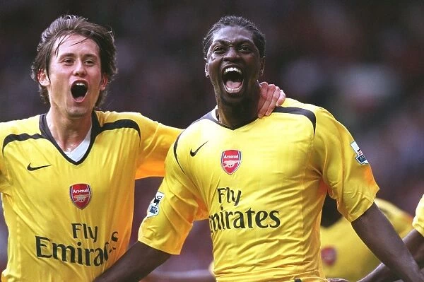 Adebayor and Rosicky: Celebrating Arsenal's Victory Over Manchester United