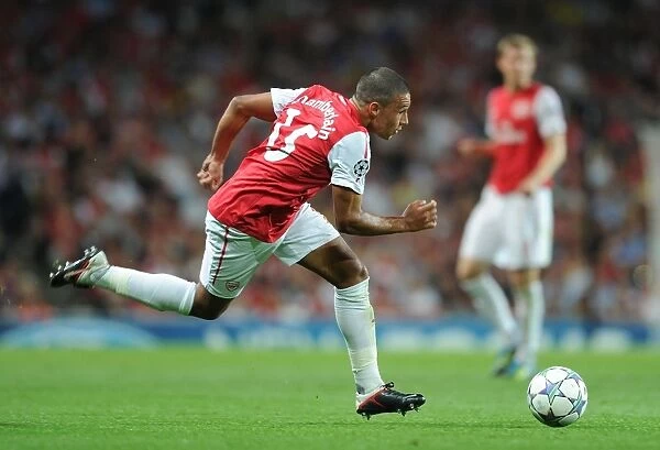 Alex Oxlade-Chamberlain: Arsenal Star in UEFA Champions League Action against Olympiacos (2011-12)
