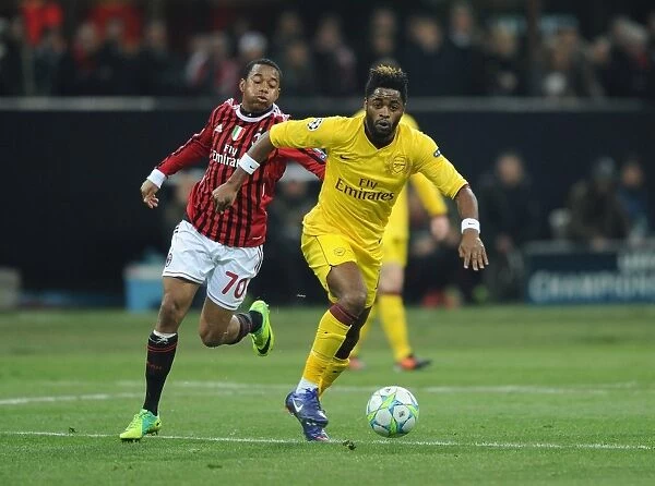 Alex Song Outmaneuvers Robinho: A Moment from the AC Milan vs. Arsenal UEFA Champions League Clash, 2012