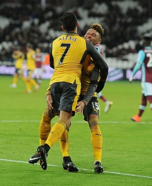 Alexis Sanchez and Alex Oxlade-Chamberlain Celebrate Arsenal's Five-Goal Lead Over West Ham United