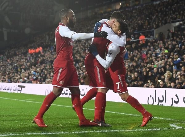 Alexis Sanchez, Calum Chambers, and Alexandre Lacazette: Celebrating a Goal for Arsenal against West Bromwich Albion (2017-18)