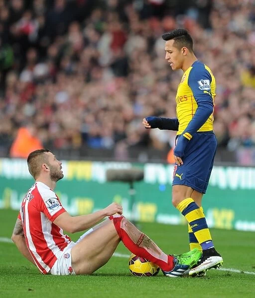 Alexis Sanchez and Phil Bardsley Clash in Arsenal's Victory over Stoke City